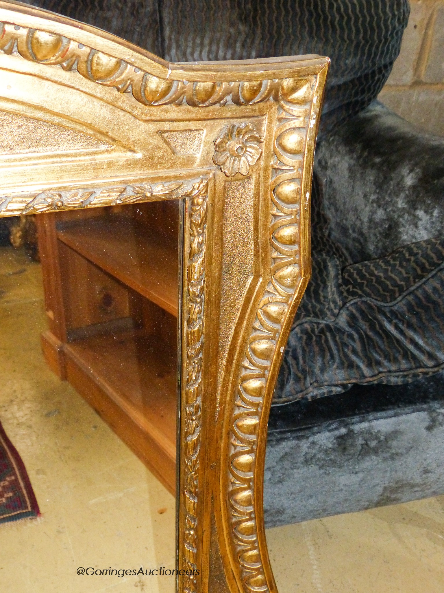 A gilt composition wall mirror in 18th century style